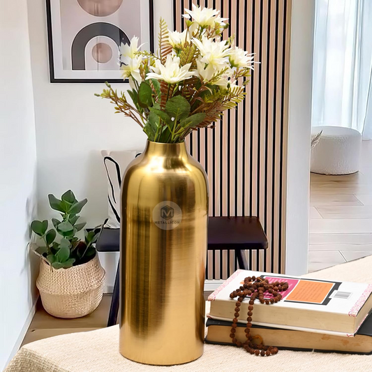 Tall Smooth Gold Iron Vase with Artificial Flowers in styled interior