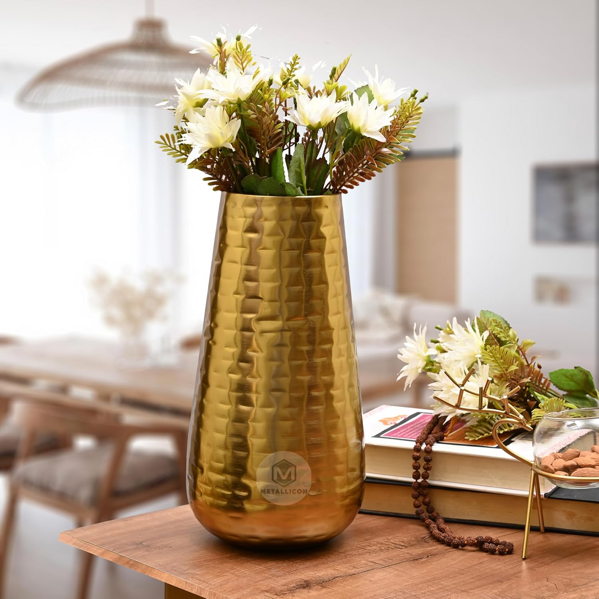 Tall Textured Gold Iron Vase with Artificial Flowers in styled interior
